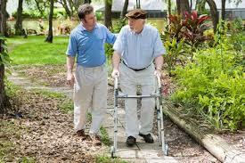 father with walker and son talking about ageism