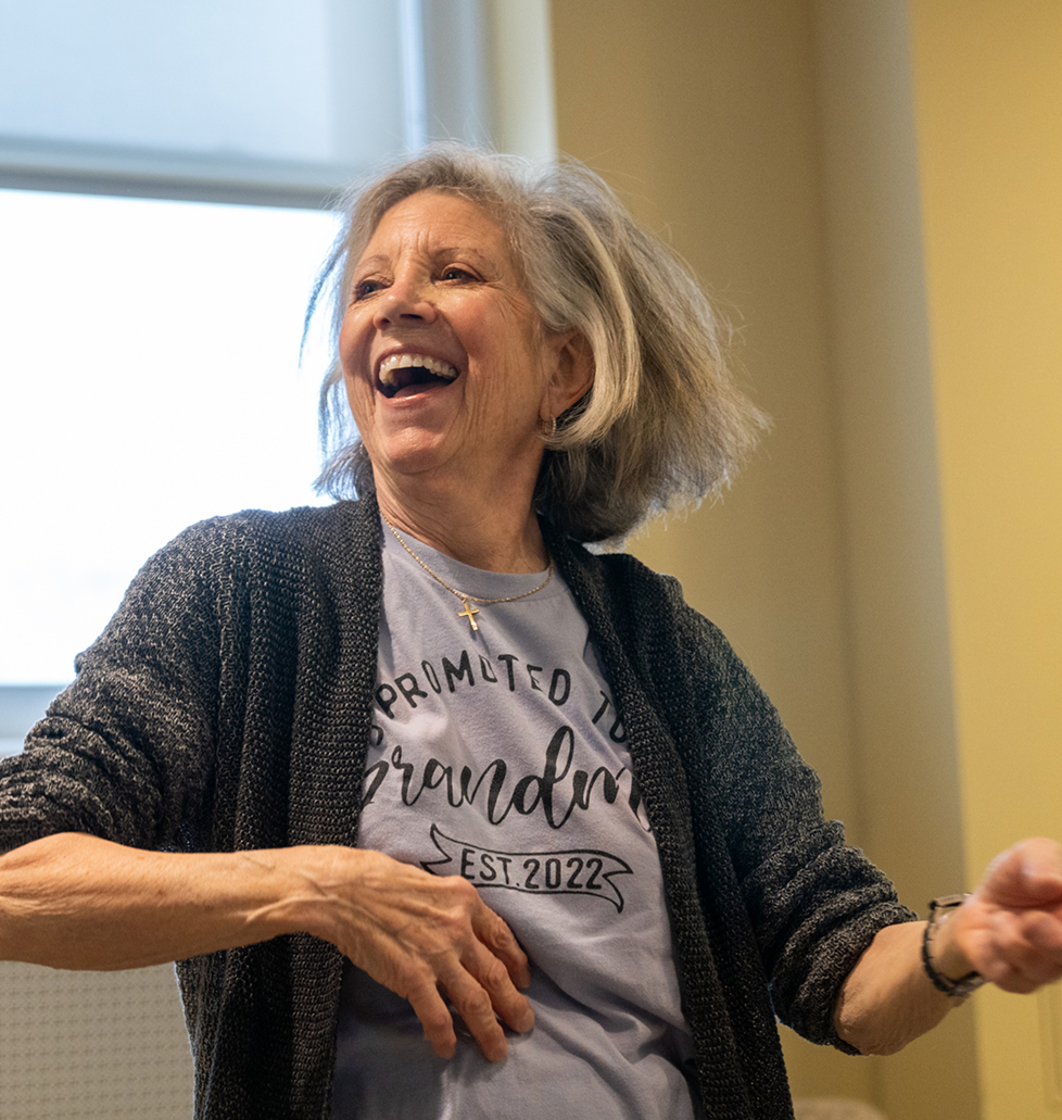 An Osborn resident enjoys a Zumba class in the fitness center.