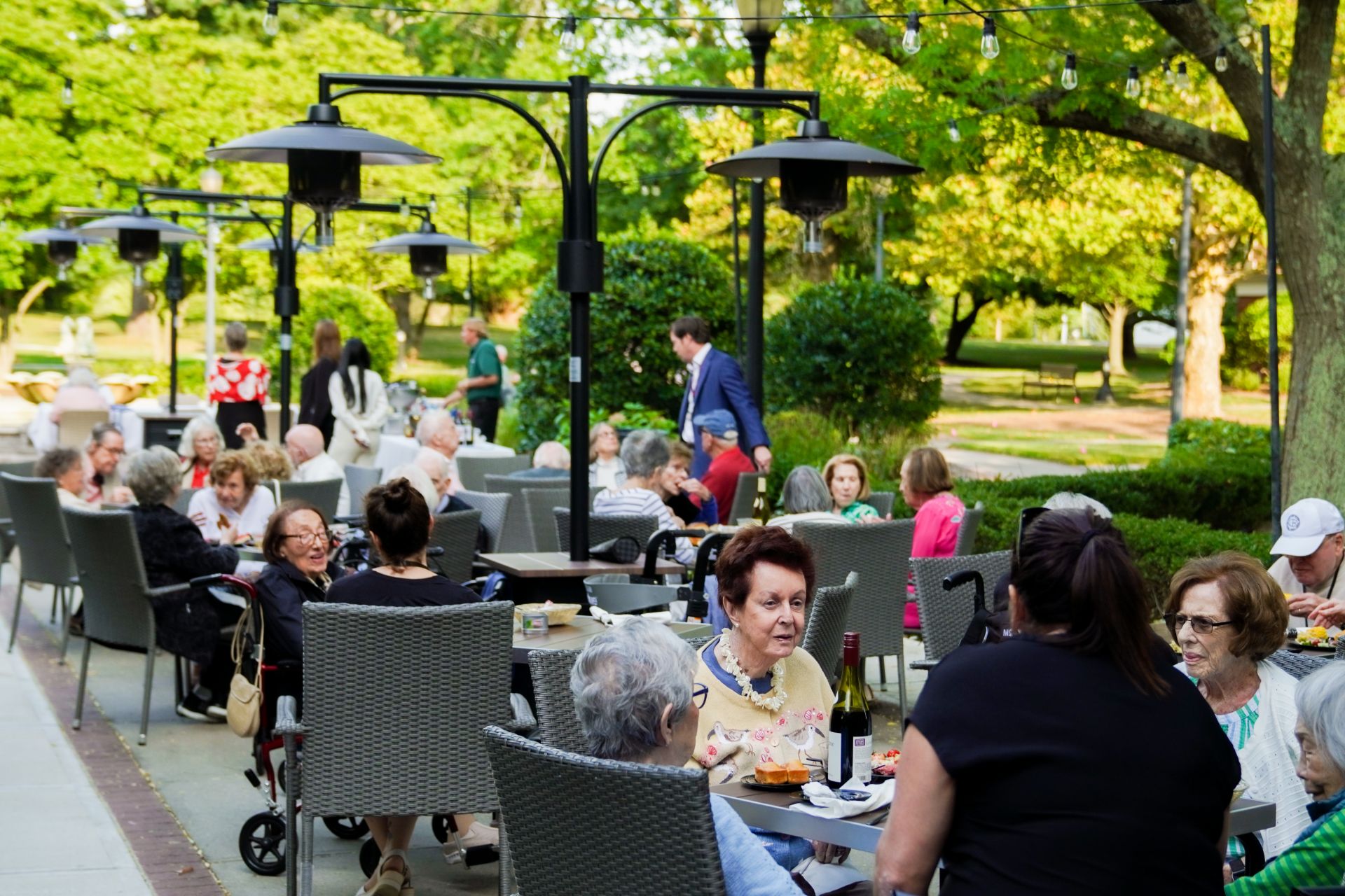 Residents of The Osborn dine outside in the summer