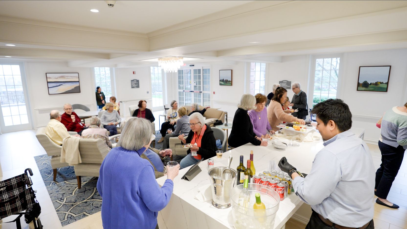Residents of The Osborn gather for a cocktail hour