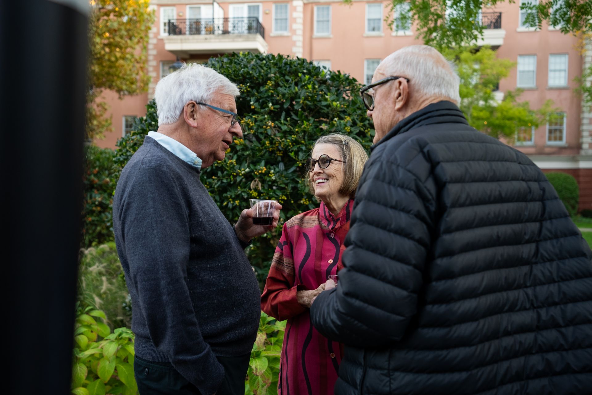 Residents of The Osborn enjoy a wine tasting outdoors