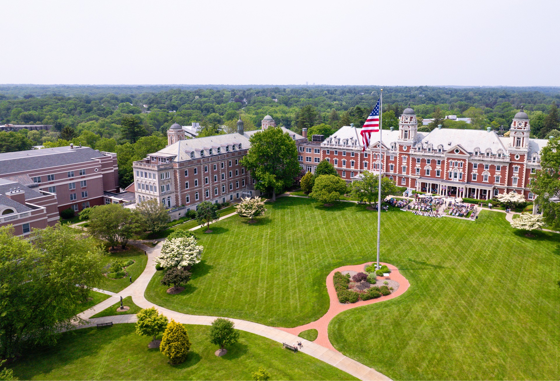 Residents of The Osborn raise a toast in the formal dining room after enjoying lunch