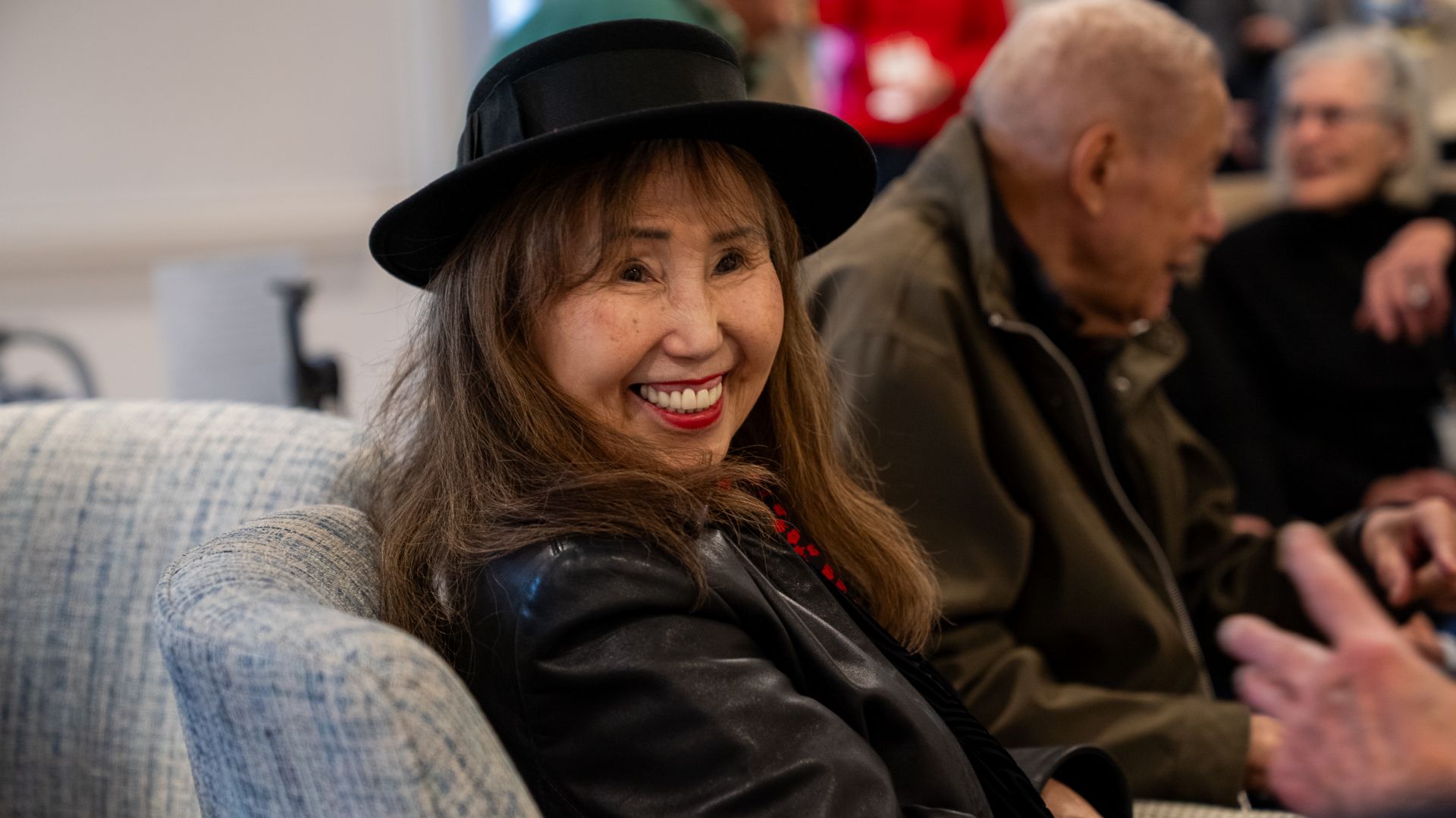 An Osborn resident joins the community for a cocktail hour