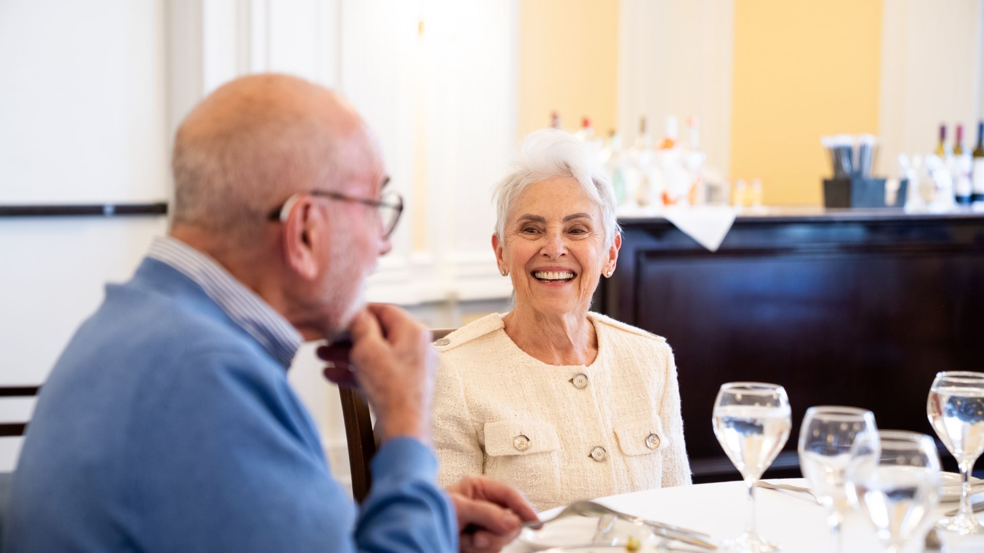 Recent residents of The Osborn enjoy lunch in the formal dining room